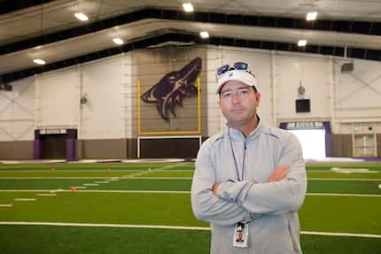 Anna High School football head coach Seth Parr, poses for a photo in their indoor field,...