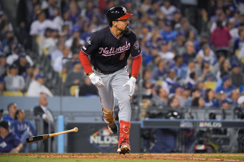 Washington Nationals' Anthony Rendon watches his home run against the Los Angeles Dodgers...