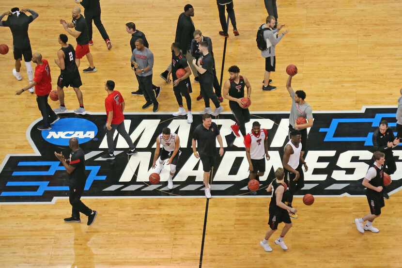 The Texas Tech Red Raiders team takes the floor during NCAA Tournament open practices held...