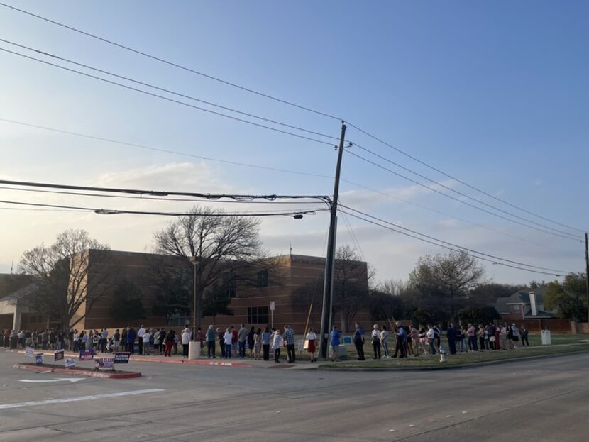 Voters lined up at the Haggard Library in Plano less than an hour before polls closed on...