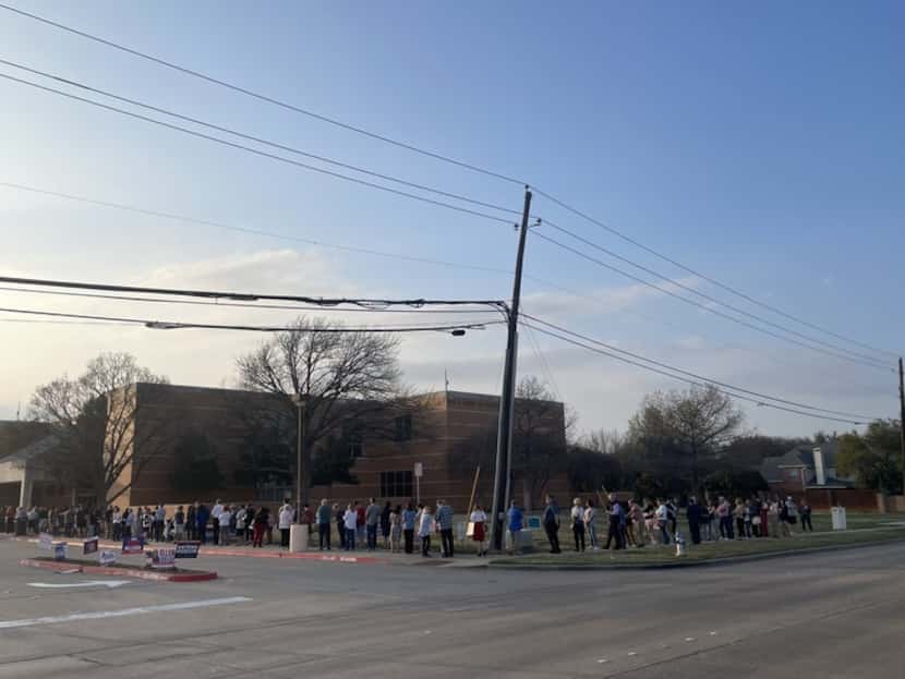 Voters lined up at the Haggard Library in Plano less than an hour before polls closed on...