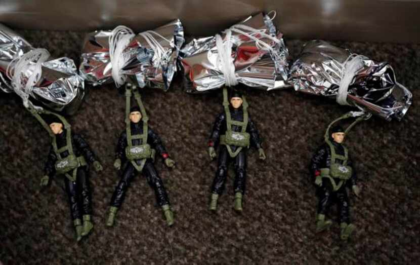 
G.I. Joe paratroopers await the start of their perilous mission on the 12th floor of the...