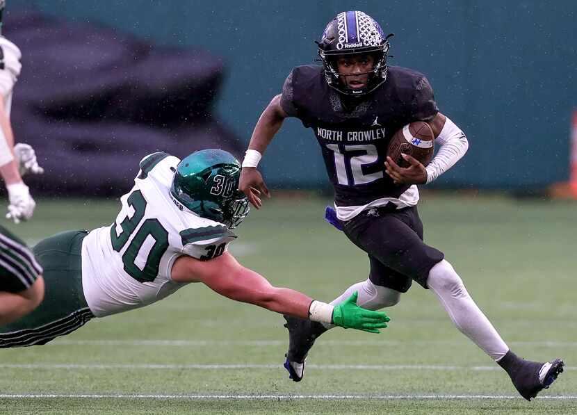 North Crowley quarterback Chris Jimerson (12) tries to elude Prosper linebacker Davis...