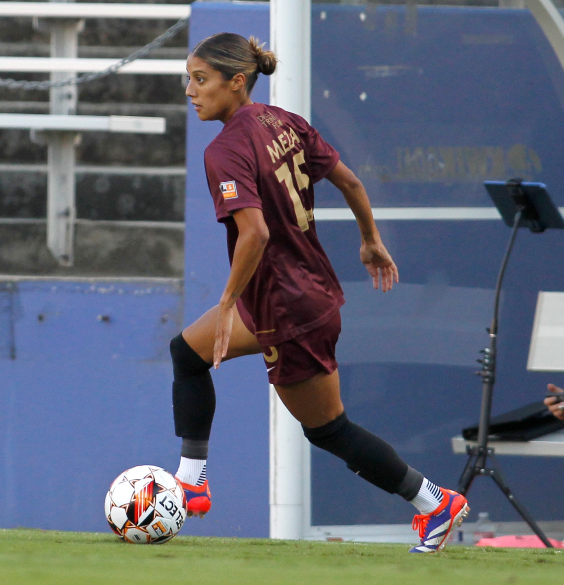 Dallas Trinity FC's Samantha Meza (15) looks to pass to a teammate during first half play in...