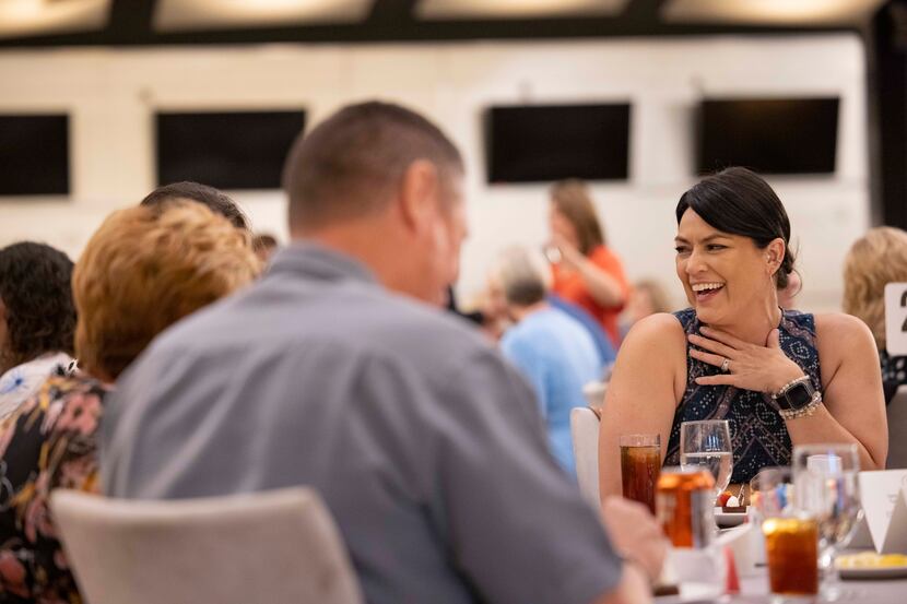 Staci Williams laughs during the Century 21 Judge Fite top awards dinner and social event on...