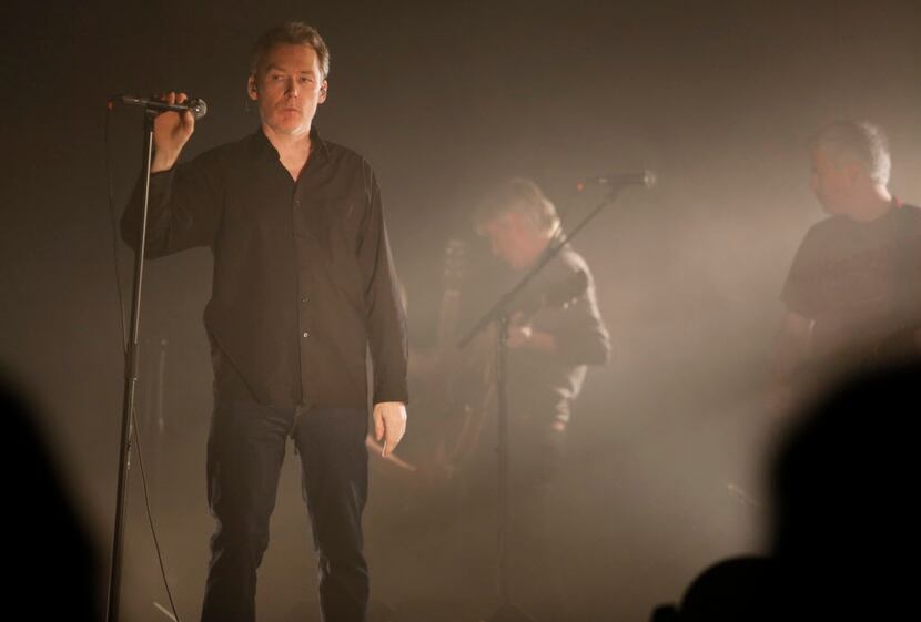 Jim Reid, left, lead singer of The Jesus & Mary Chain performs with his band at the Bomb...