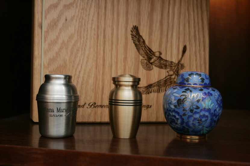 Cremation urns are on display at the Aurora Casket Co. Inc., in Aurora, Ind., Monday Feb....