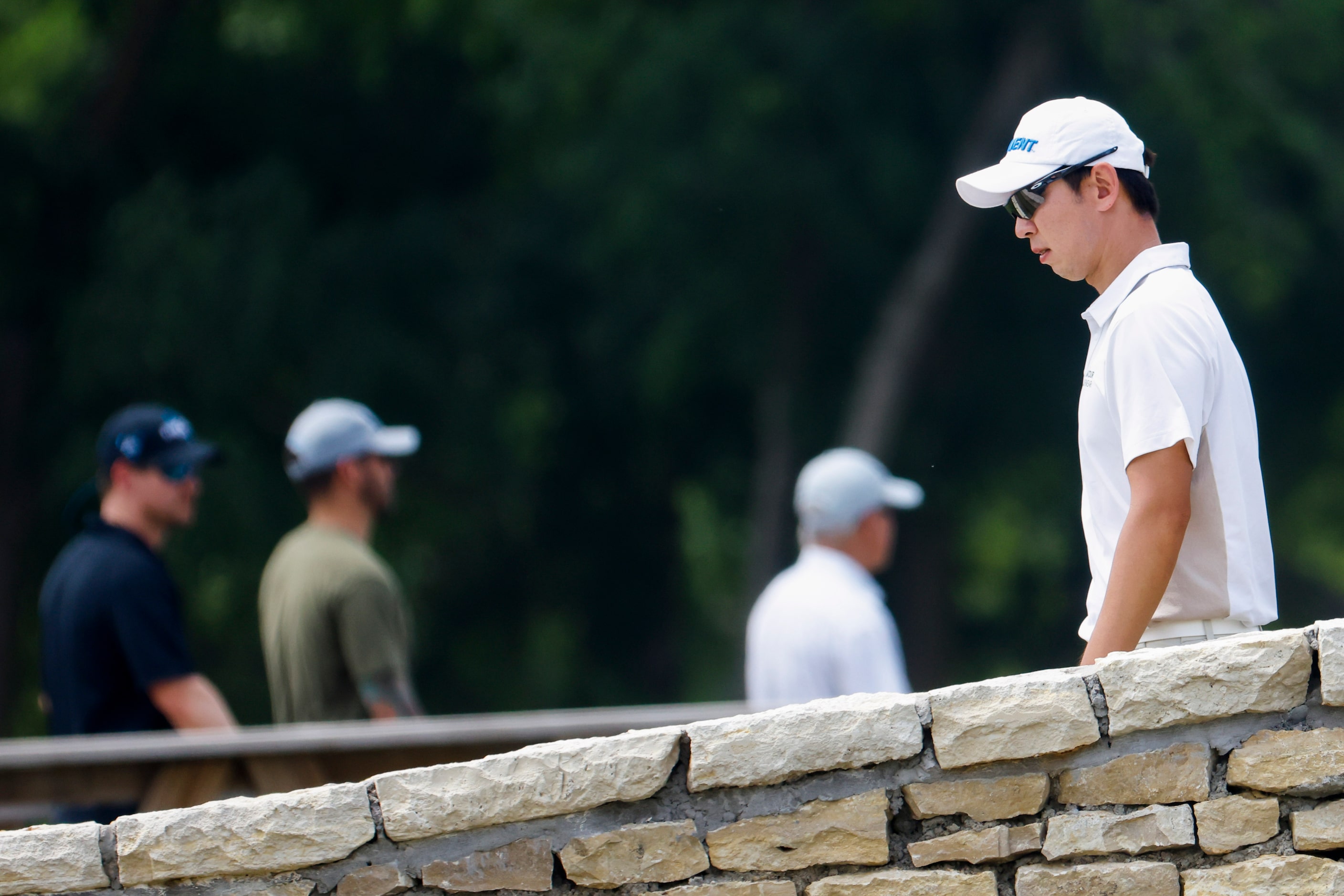 S.Y. Noh of South Korea walks to the 18th hole green during the second round of the AT&T...