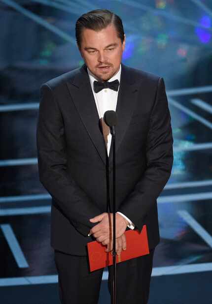 Leonardo DiCaprio presents the award for best actress in a leading role at the Oscars in...