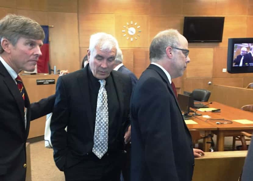 Kerry Max Cook (center) left the Smith County courtroom in  Tyler on June 6 with lawyer Gary...