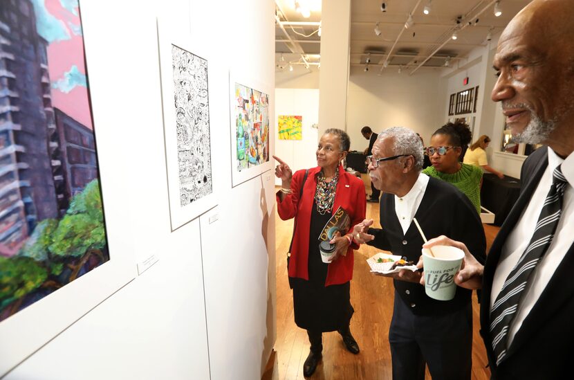 Alumn Diane Miles, left, Donald Payton, Booker T's theater conservatory director Guinea B....