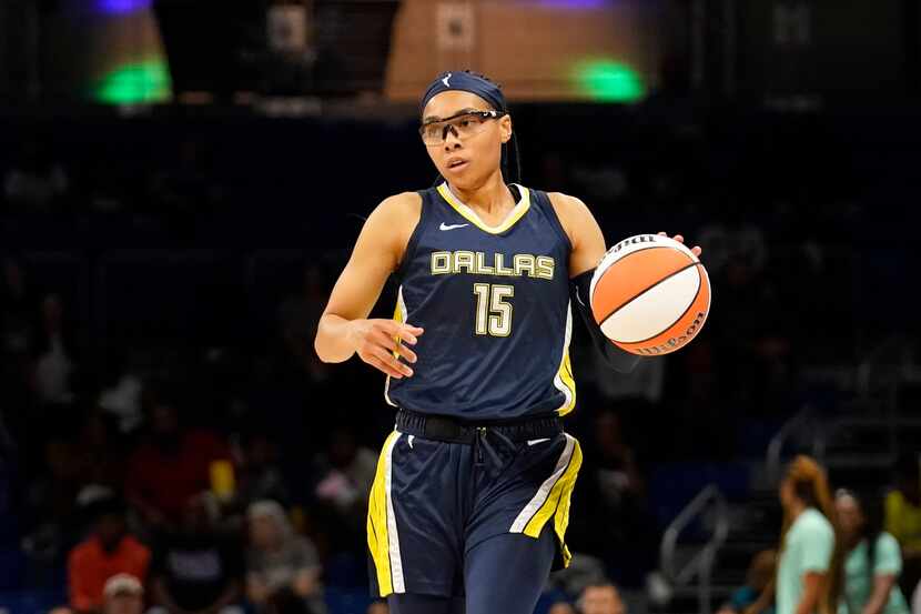 FILE - Dallas Wings guard Allisha Gray handles the ball during a WNBA basketball game...