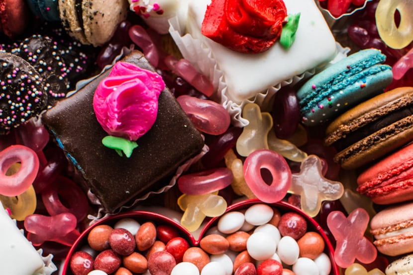 Petit fours, macarons, jelly beans and more comprise a Valentine's Day dessert board