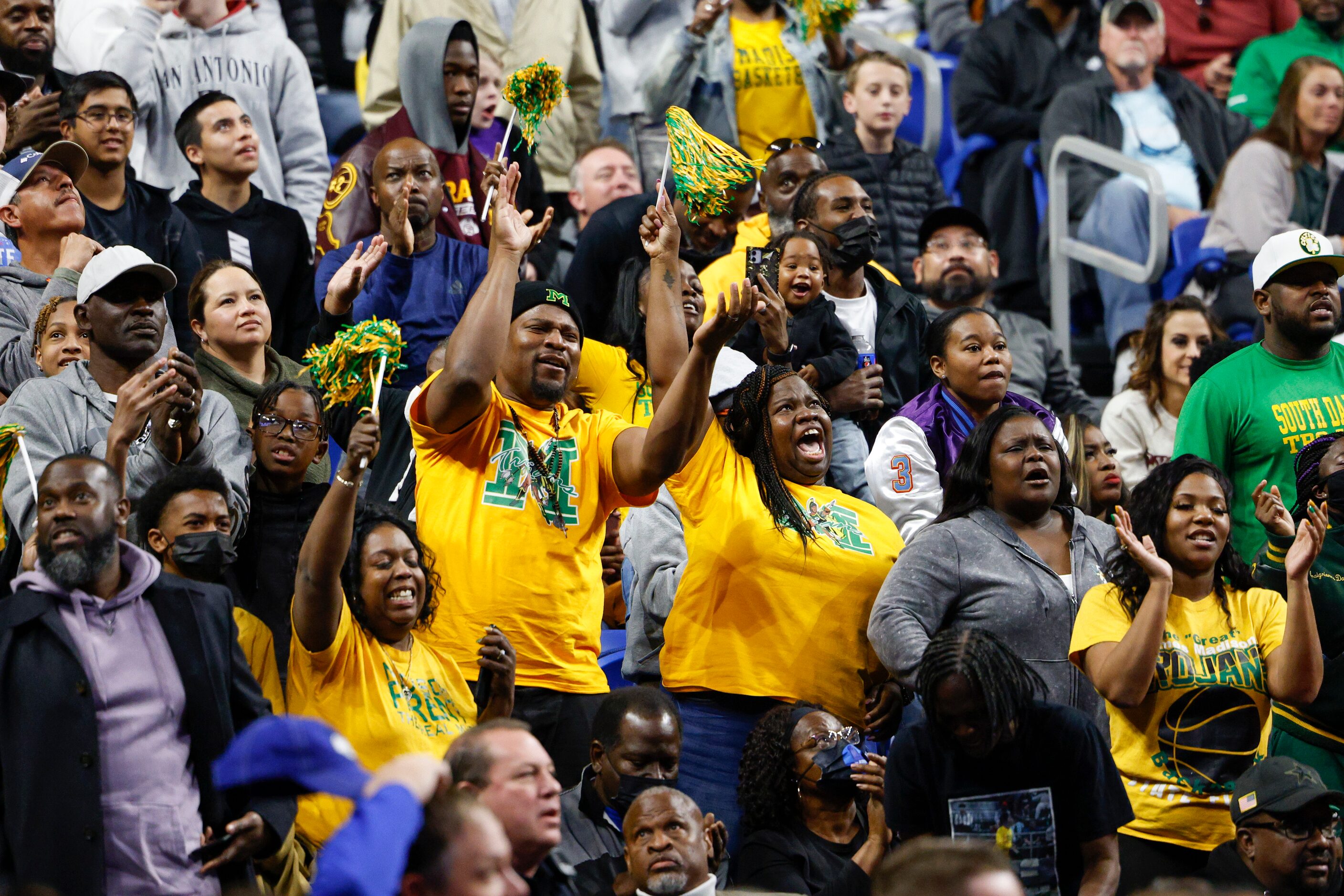 Madison fans celebrate during the fourth quarter of the Class 3A state championship game...