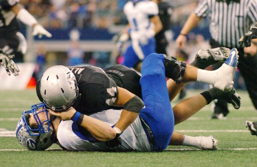 Guyer senior fullback Connor Allen (44) sacks Georgetown senior quarterback Jake Hubenak...