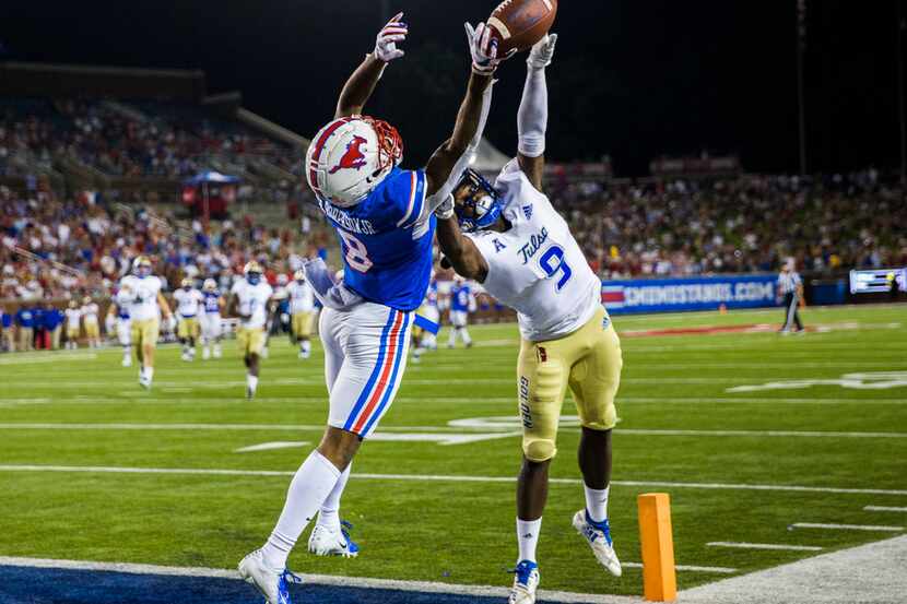 FILE - SMU wide receiver Reggie Roberson Jr. (8) can't make a catch as Tulsa cornerback...