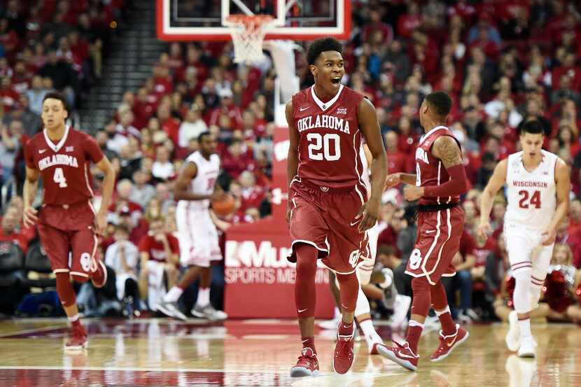 MADISON, WI - DECEMBER 03:  Kameron McGusty #20 of the Oklahoma Sooners reacts to a three...