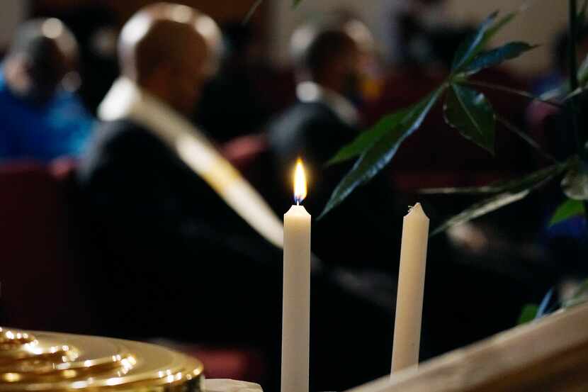 A candle was lit in remembrance of the three members who passed away in the last 12 months...