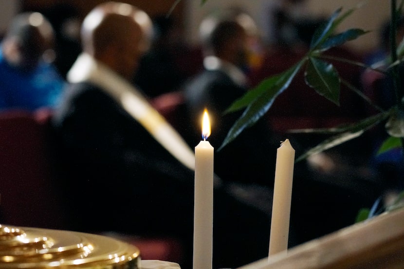 A candle was lit in remembrance of the three members who passed away in the last 12 months...