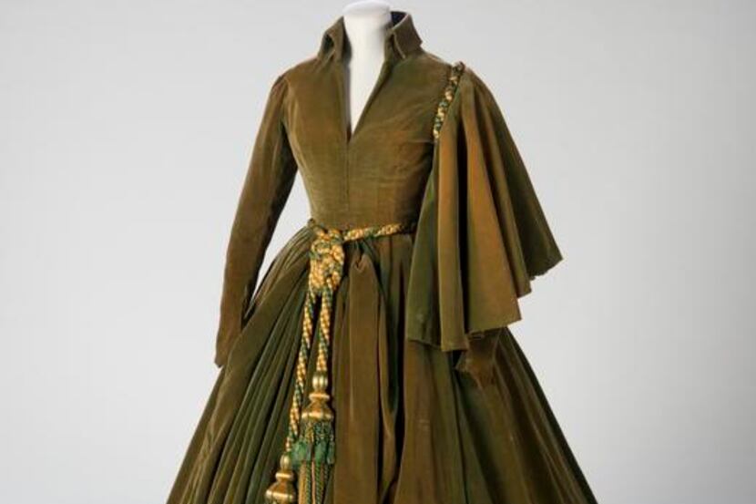 
The dress made from green velvet drapes may be the most memorable costume from the film. 
