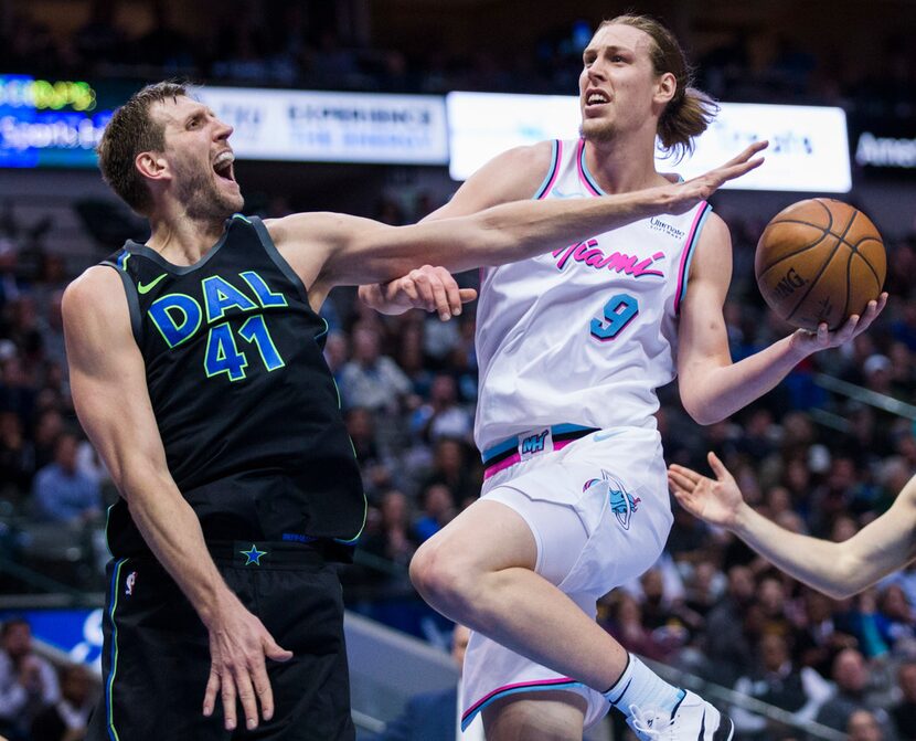 Dallas Mavericks forward Dirk Nowitzki (41) tries to block a shot by Miami Heat center Kelly...