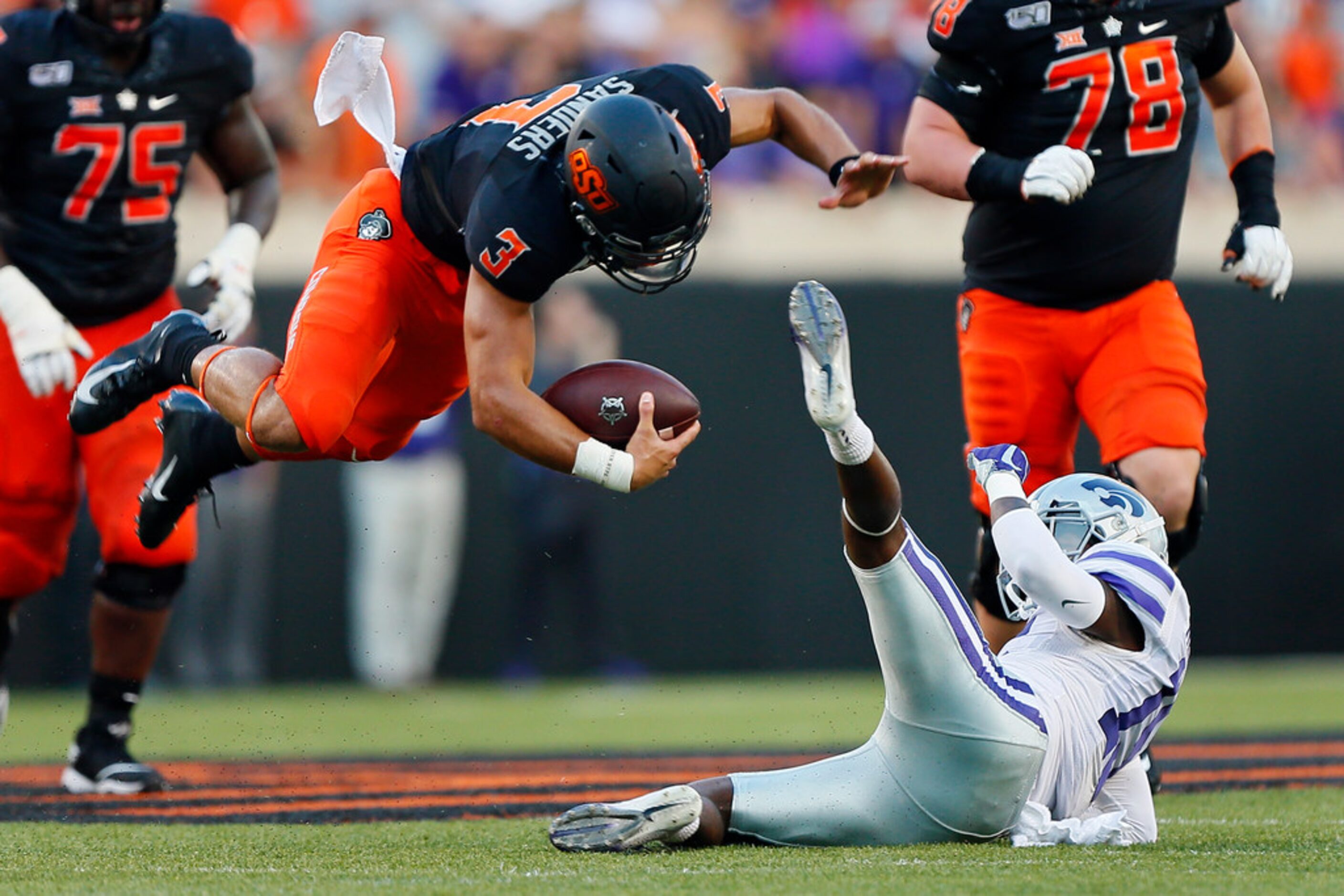 STILLWATER, OK - SEPTEMBER 28:  Quarterback Spencer Sanders #3 of the Oklahoma State Cowboys...