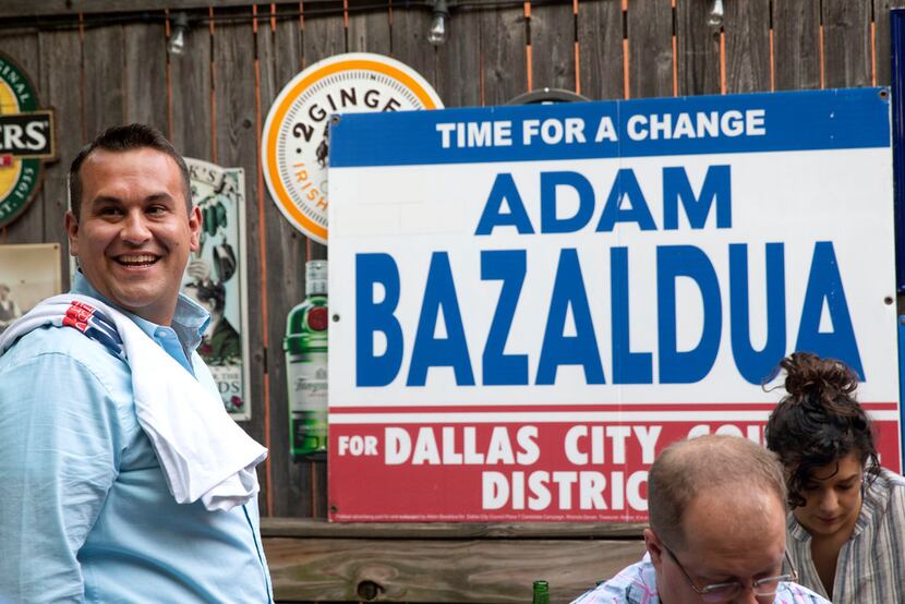 Adam Bazaldua, the candidate for District 7 member of the Dallas City Council, visits with...