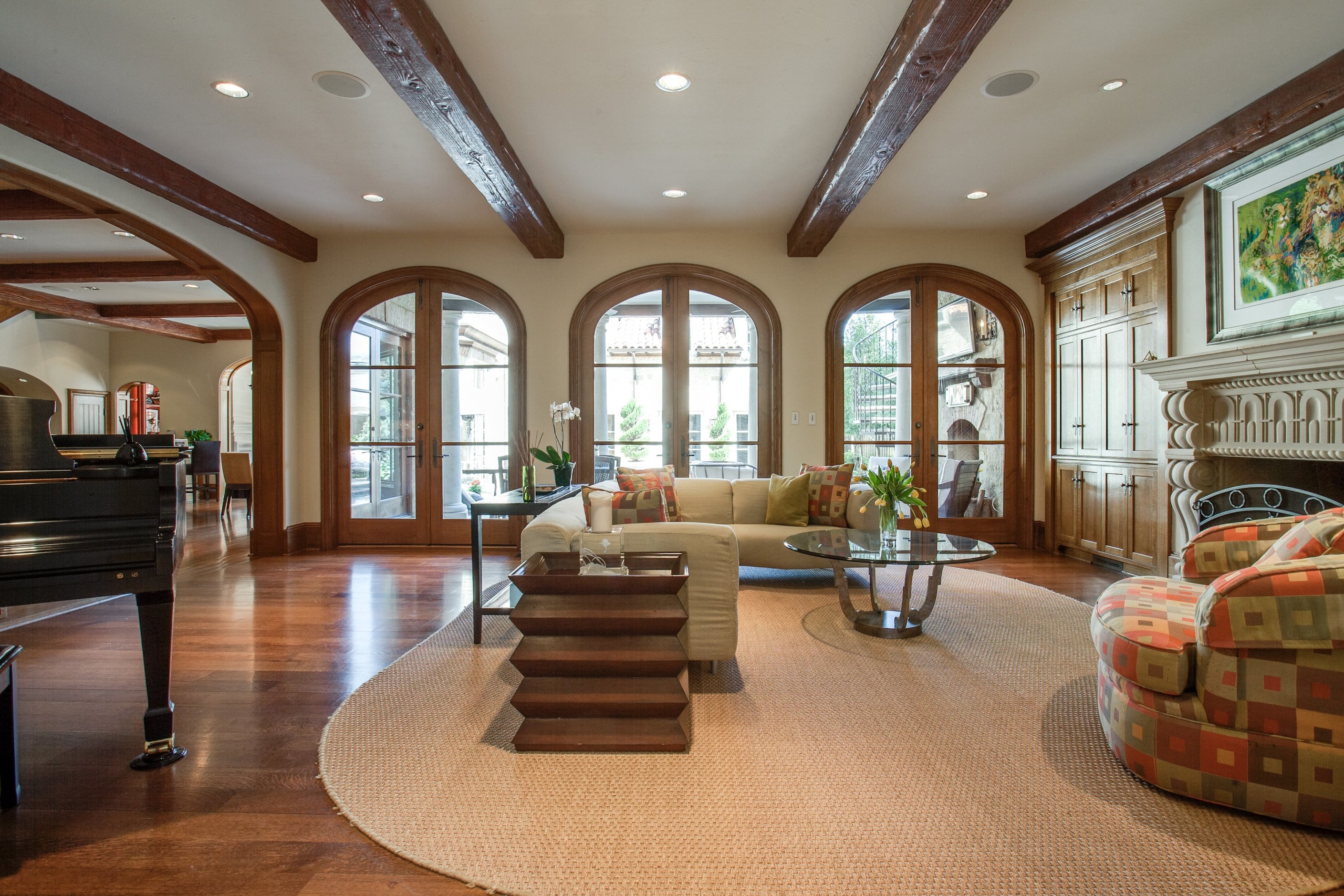 Large glass doors and windows provide the home with plenty of natural light.