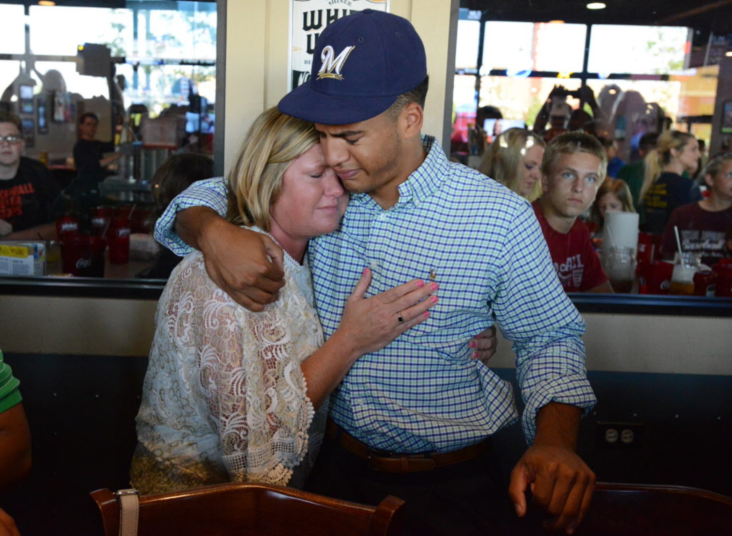 Michelle Grisham and son Trent Clark share an emotional moment when Trent was chosen by the...