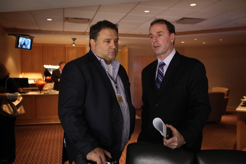 Stars owner Tom Gaglardi talks with general manager Joe Nieuwendyk in one of the suites at...