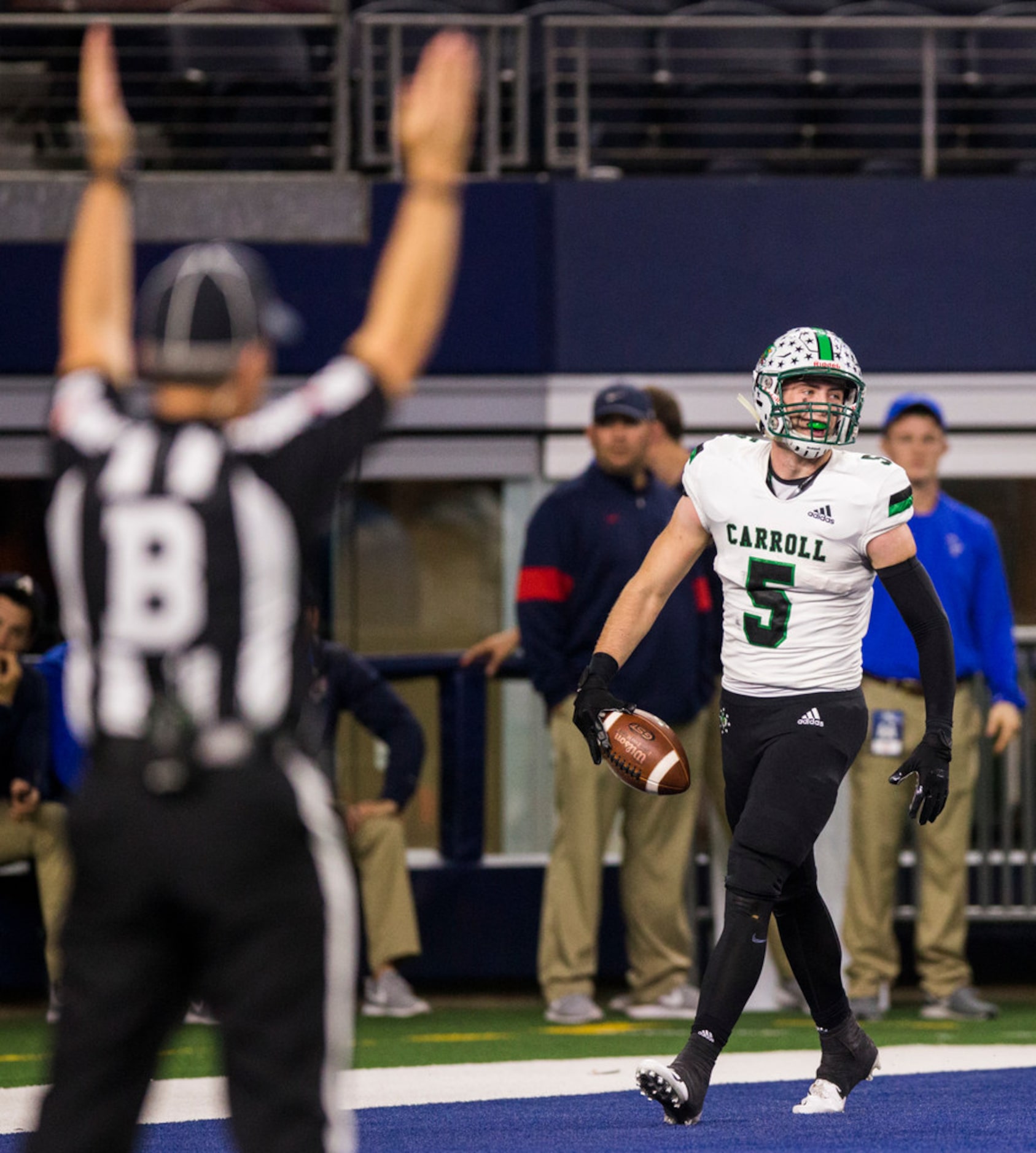 Southlake Carroll wide receiver Owen Allen (4) celebrates a touchdown during the first...