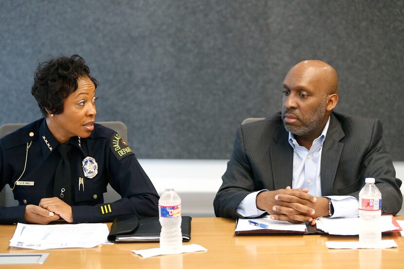 Dallas Police Chief U. Renee Hall looks at Dallas City Manager T.C. Broadnax during a...
