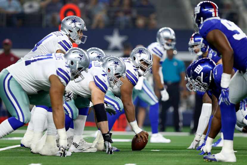 The Dallas Cowboys offense lines up against the New York Giants defense during the second...