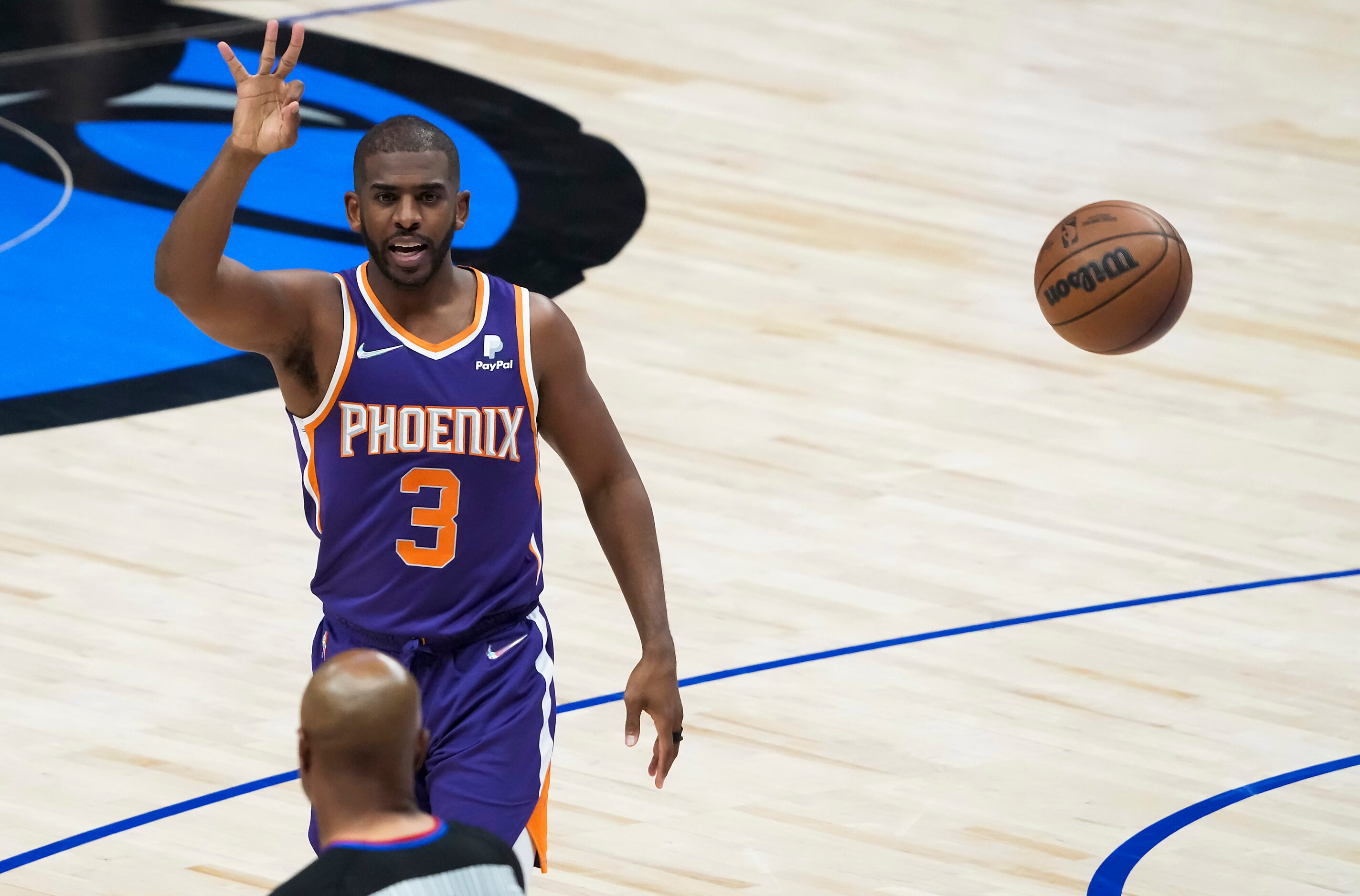 Phoenix Suns guard Chris Paul (3) reacts after being fouled by Dallas Mavericks forward Maxi...