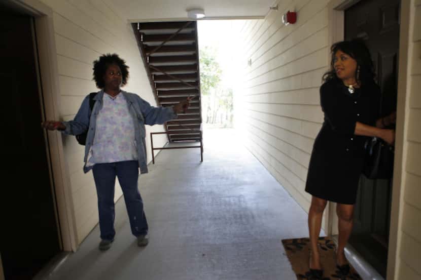 Essie Hayes (left) and Drevelyn Matilda Minor chatted in a hallway at North Court Villas in...