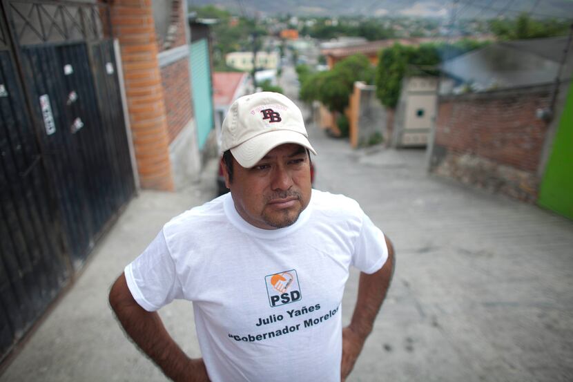 Mayoral candidate Saul Garcia stands in front of his home in Emiliano Zapata, Morelos. Men...