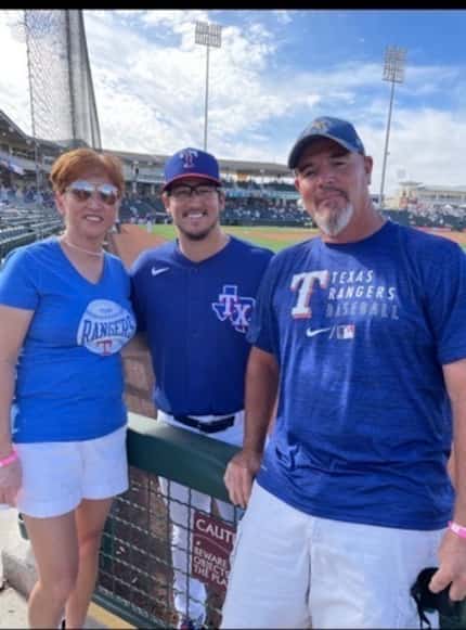 Rangers pitcher Dane Dunning with his parents, Misu and John