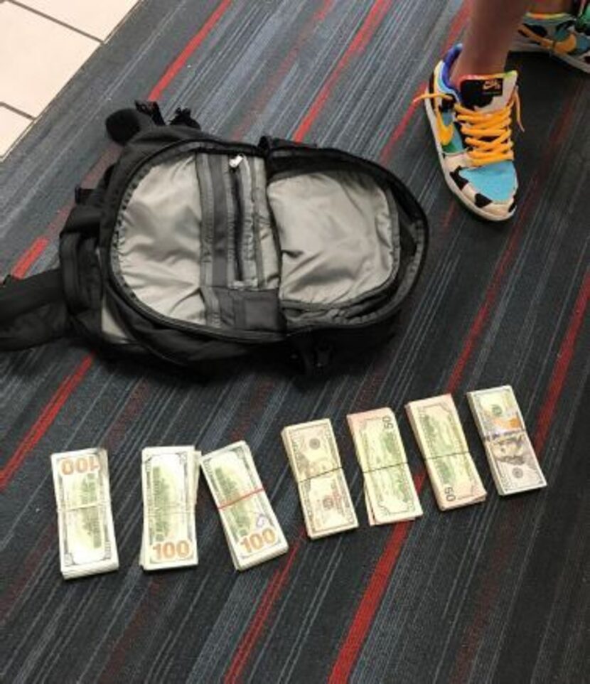 Federal agents seized cash from an alleged California marijuana dealer at DFW International...