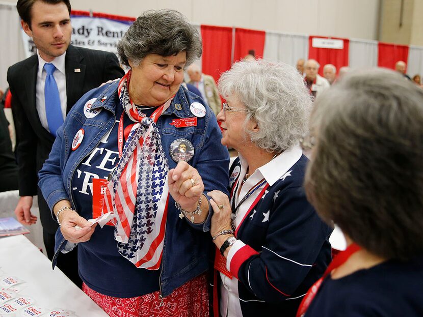  Maggie Wright (middle left) talks with Irma Stringer at a Ted Cruz booth during the 2016...