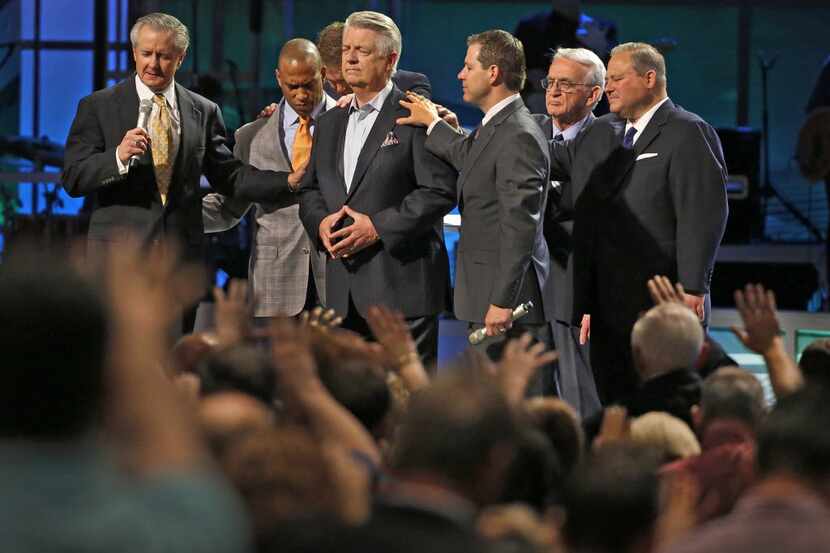 Mike Buster (left), executive pastor at Prestonwood Baptist Church, has filed a lawsuit...