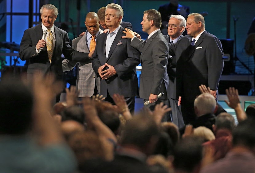 Executive pastor Mike Buster (left) with lead pastor Jack Graham (center) at Prestonwood...