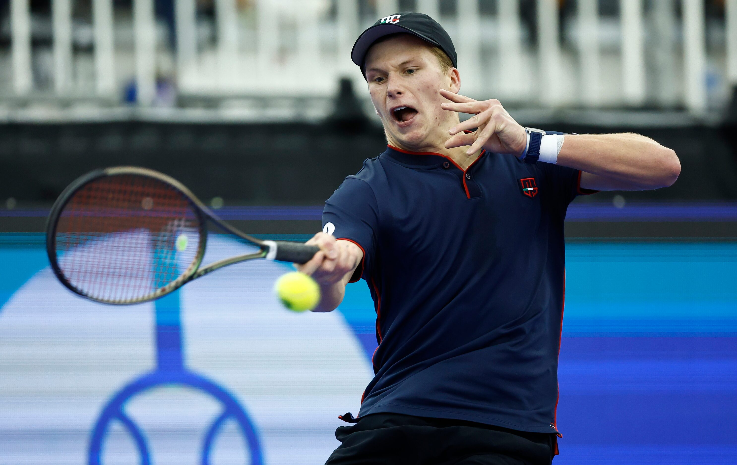 Jenson Brooksby returns the ball during the finals of the ATP Dallas Open against Reilly...