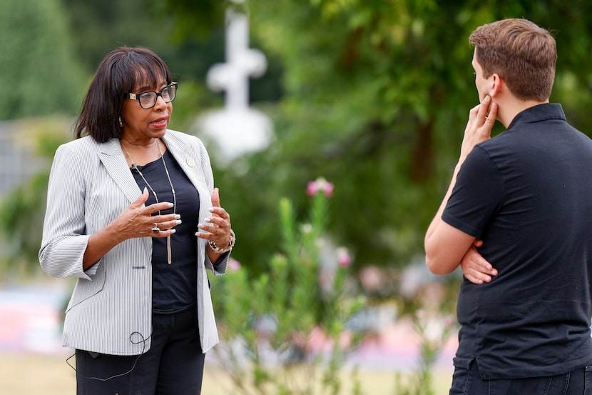 Dallas city councilwoman Carolyn King Arnold talks with reporters outside of For Oak Cliff,...