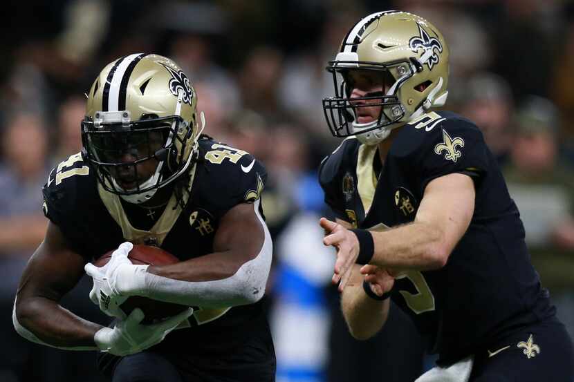 NEW ORLEANS, LOUISIANA - NOVEMBER 22: Alvin Kamara #41 of the New Orleans Saints runs with...