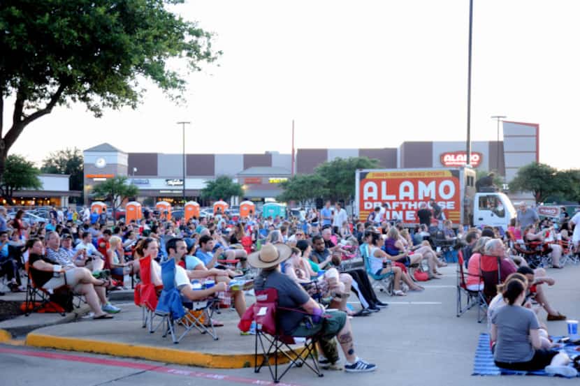As the sun set, the parking lot at Alamo Drafthouse in Richardson filled up with families...