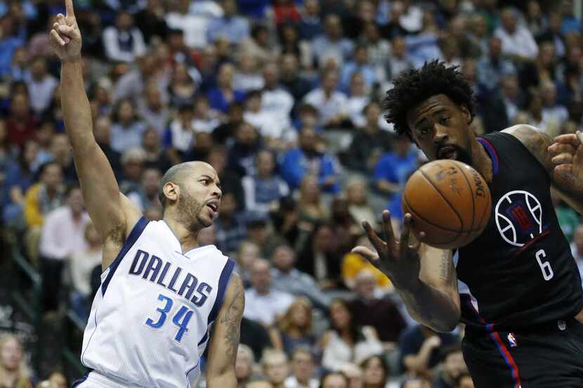 Los Angeles Clippers center DeAndre Jordan (6) retrieves the ball while Dallas Mavericks...
