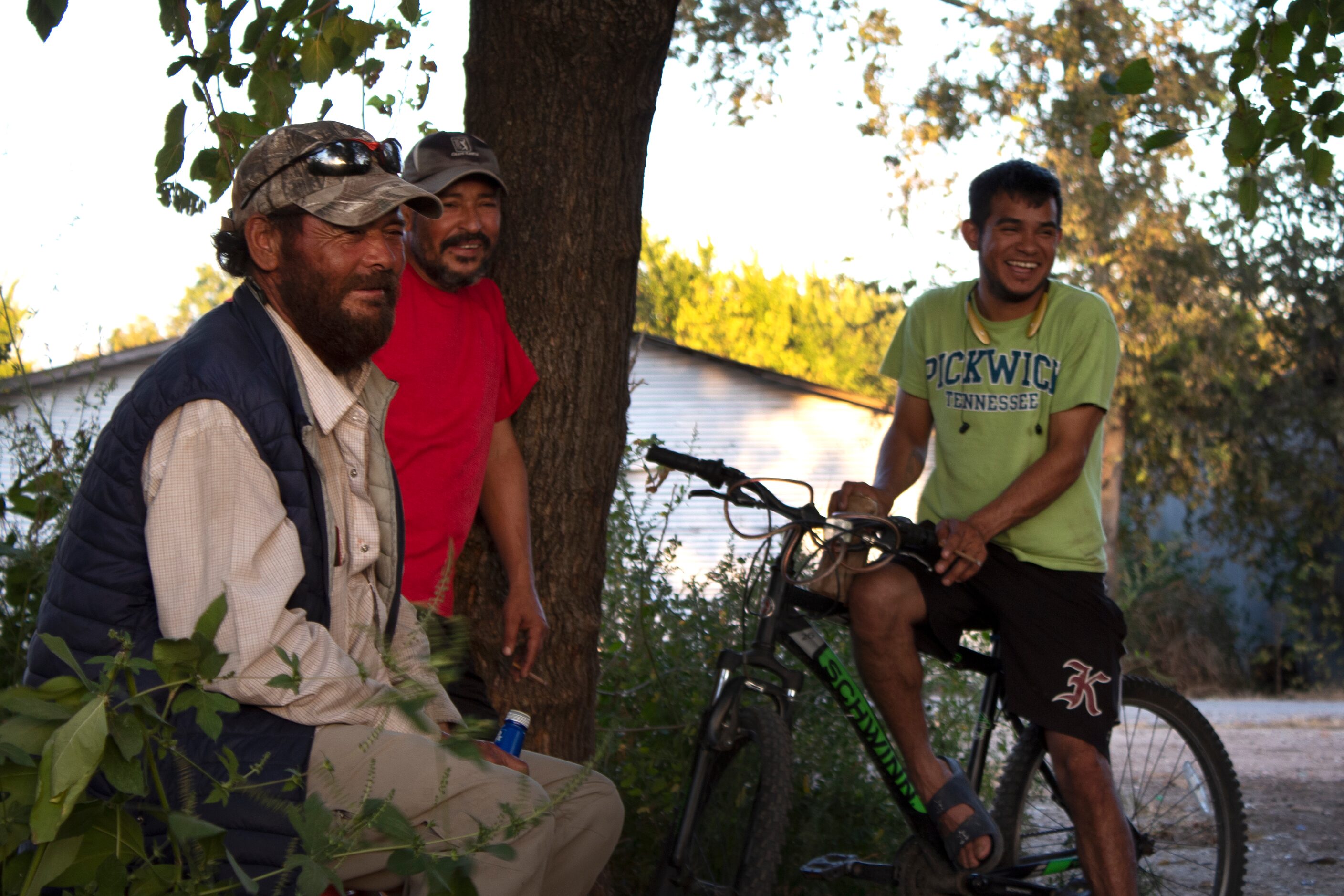 McKinney, Texas 10/10/2021 Pablito (left), Bos, and another companion laugh at Garcia...