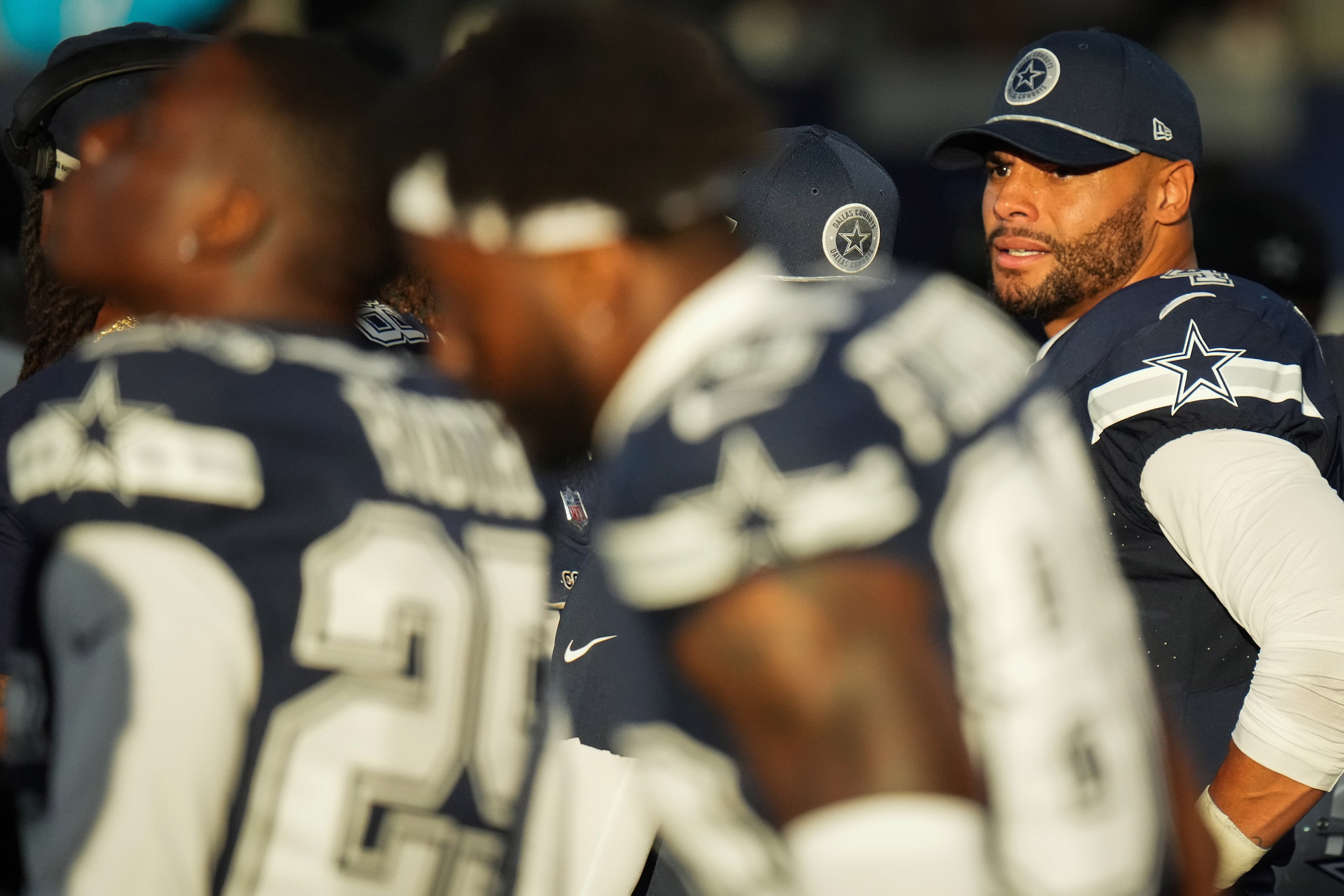 Dallas Cowboys quarterback Dak Prescott (4) looks on from the bench after being preplaced by...