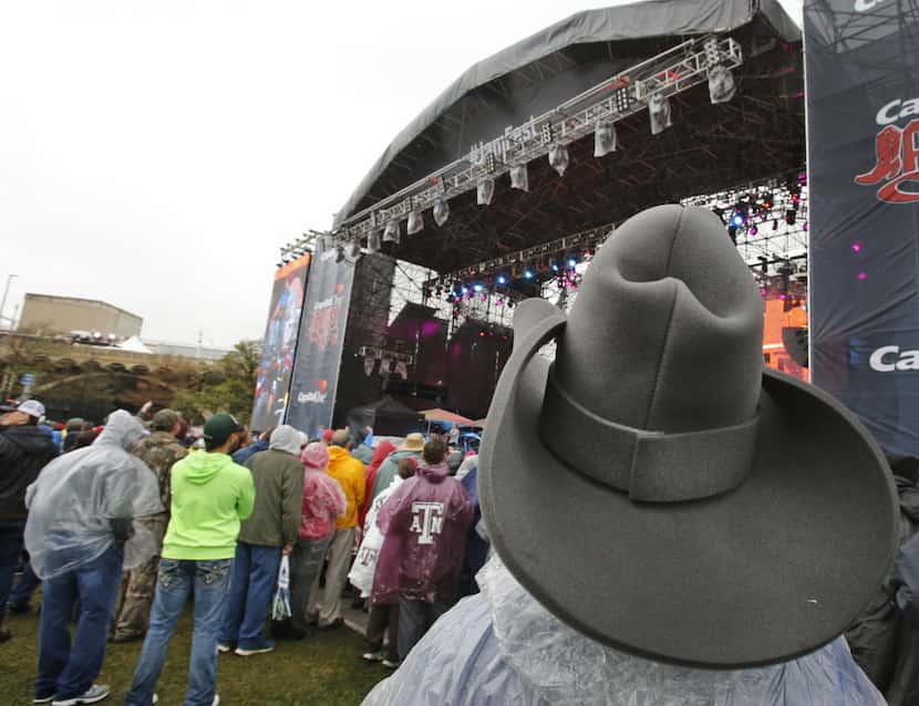 Fans listen to Pat Green perform during the March Madness Music Festival in Dallas on...