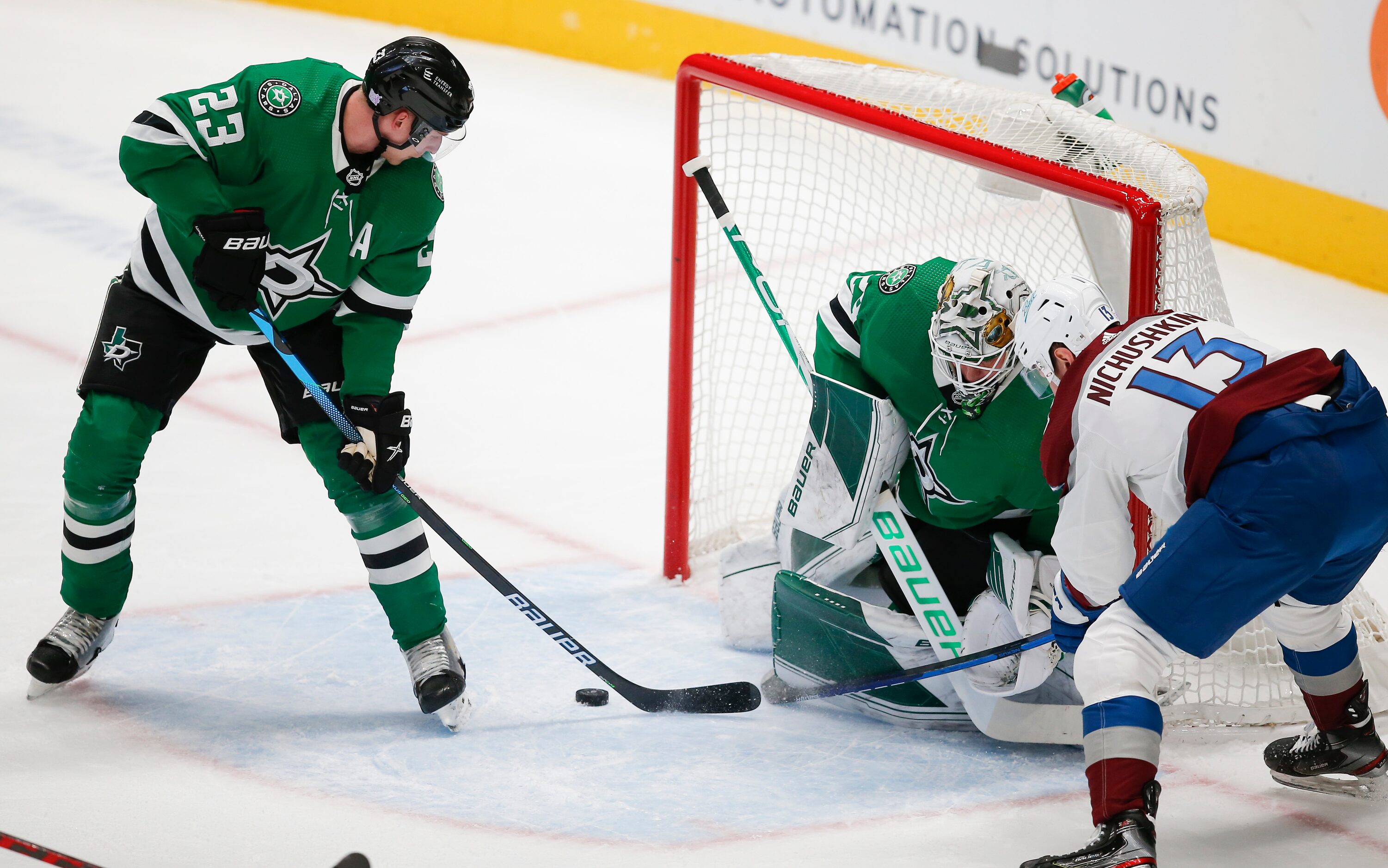 Colorado Avalanche forward Valeri Nichushkin (13) looks for the rebound as Dallas Stars...